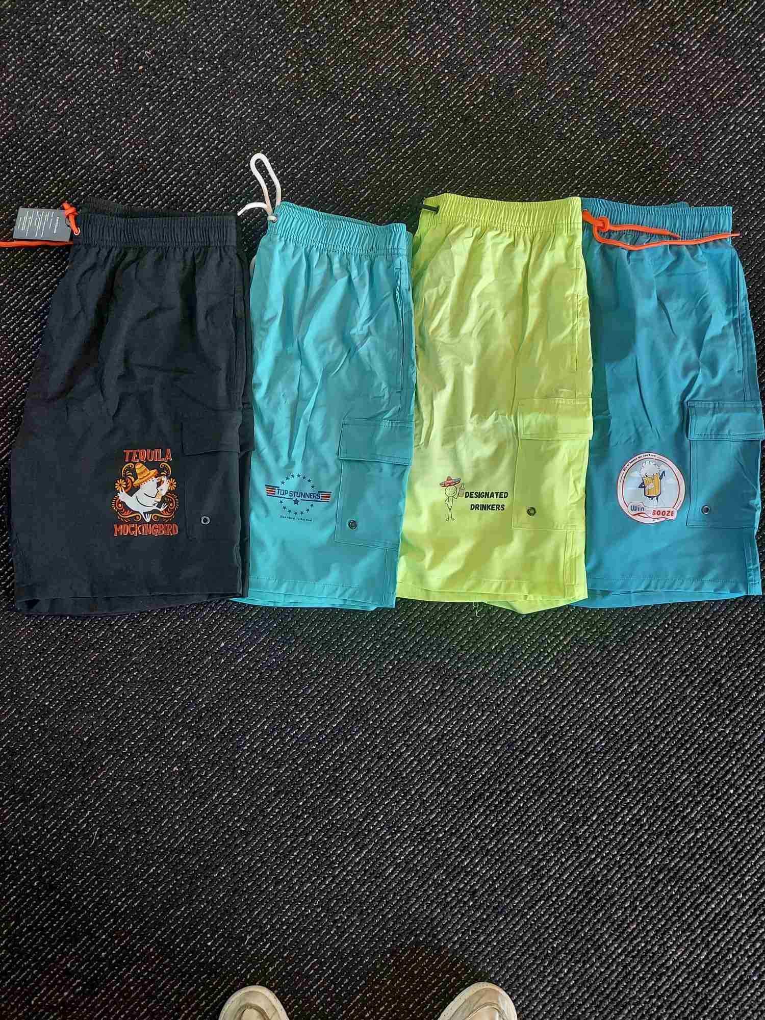 Set of custom printed swim trunks with novelty group event graphics — Ultimate Swag, Mooresville NC