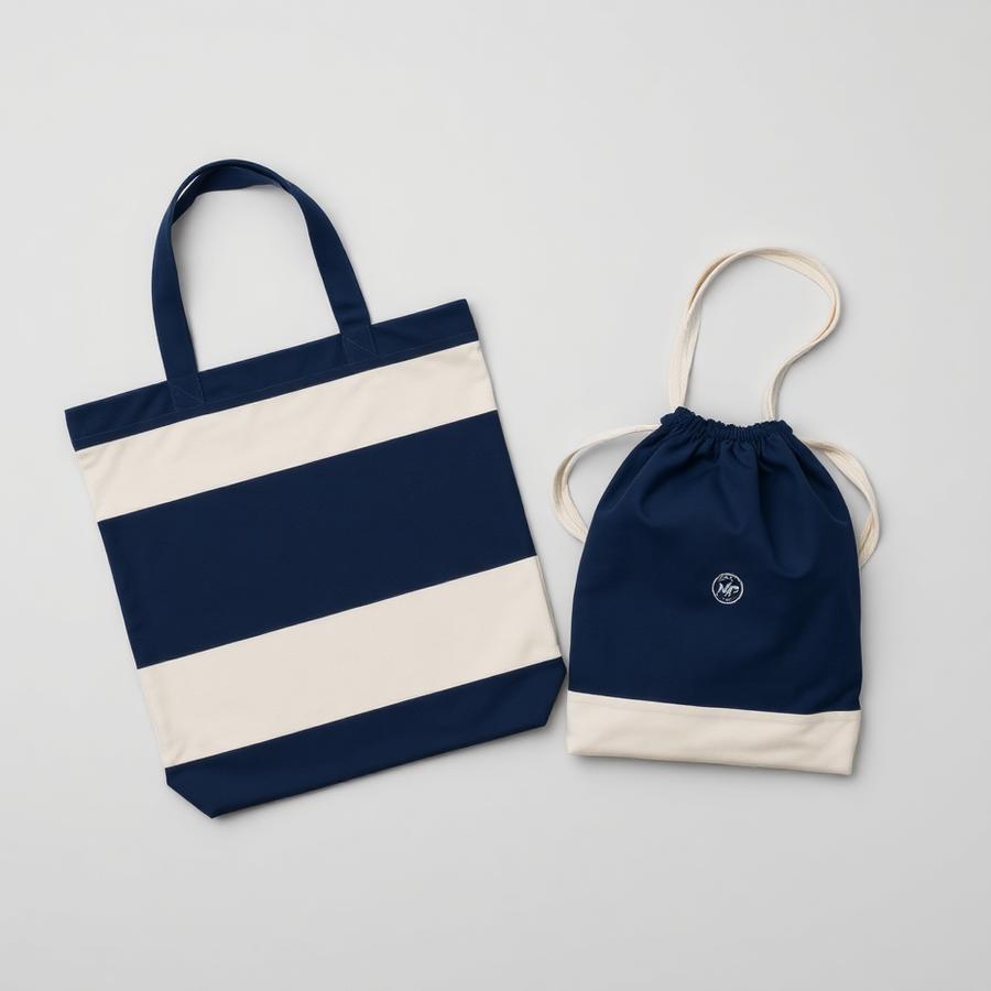 Custom navy and natural canvas tote bag and drawstring bag with embroidered logo